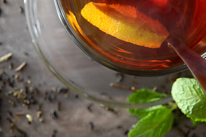 Macro detail of a glass teacup with lemon and mint, a Food & Drink Photo by Davizro's Market