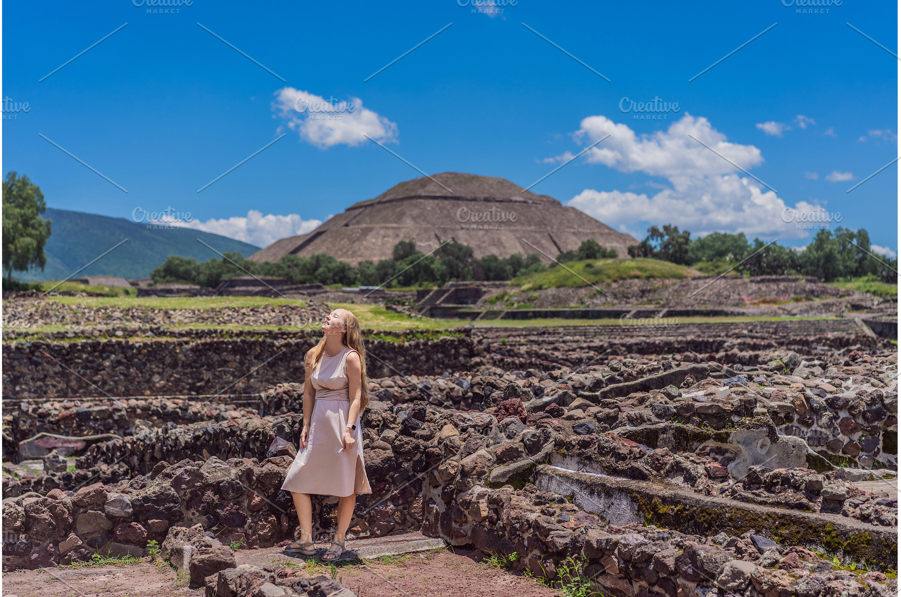 Female tourist standing in front of, a Person Photo by Elizaveta Galitskaya