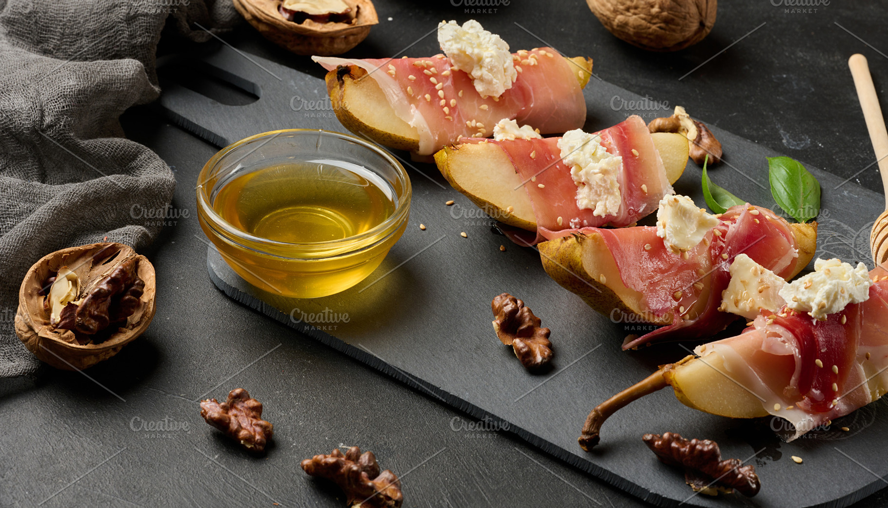 A delicious combination of sweet pear, salty prosciutto and crea, a Food & Drink Photo by ndanko