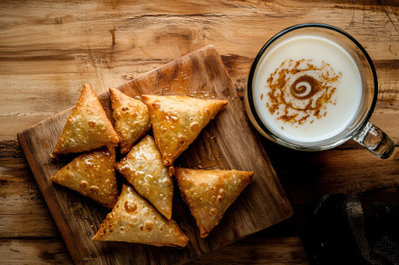 Crispy Indian Samosas with milk, a Food & Drink Photo by Virgo Studio