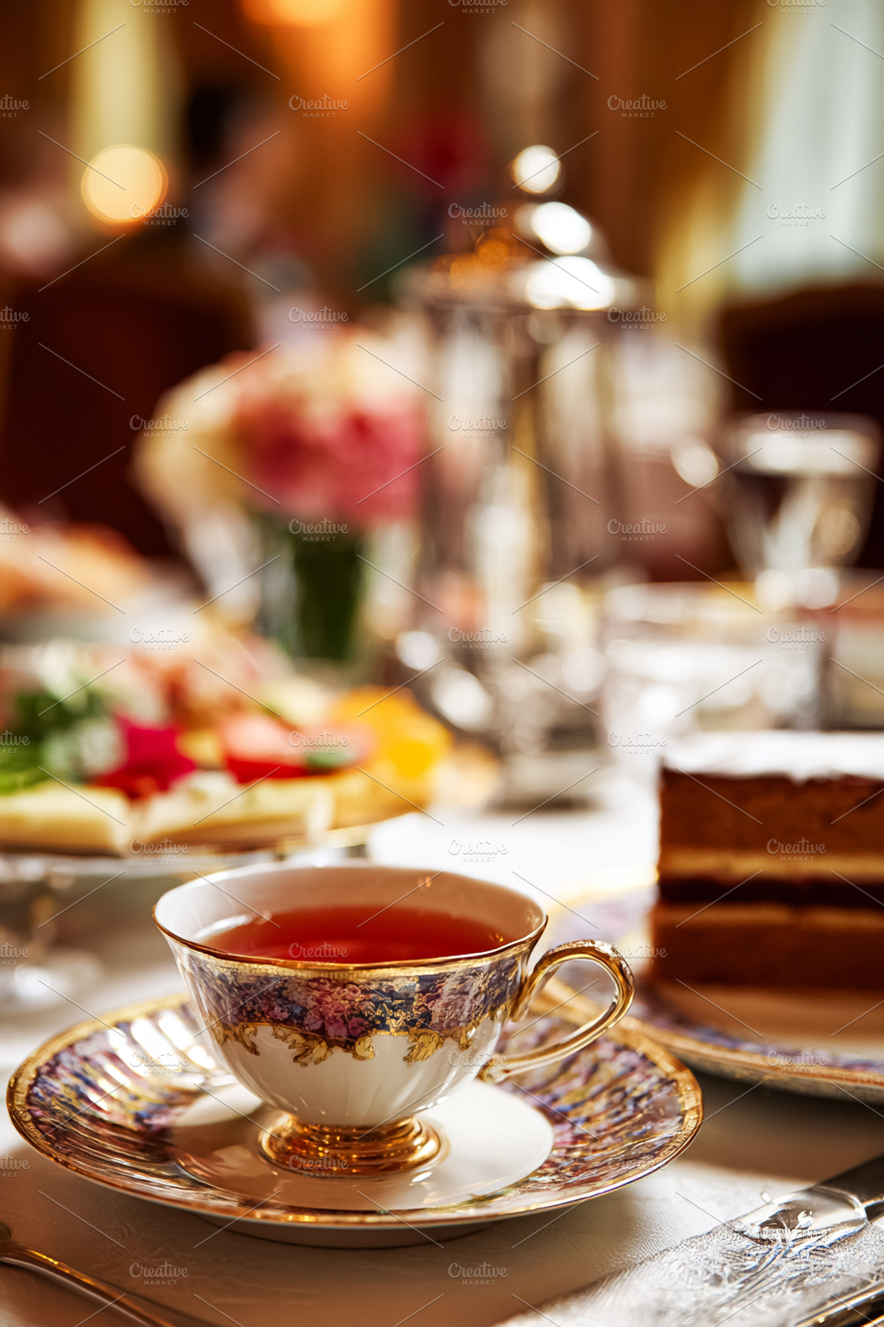 Elegant afternoon tea setting with luxury porcelain cup and sauc, a Food & Drink Photo by Studio ANNA