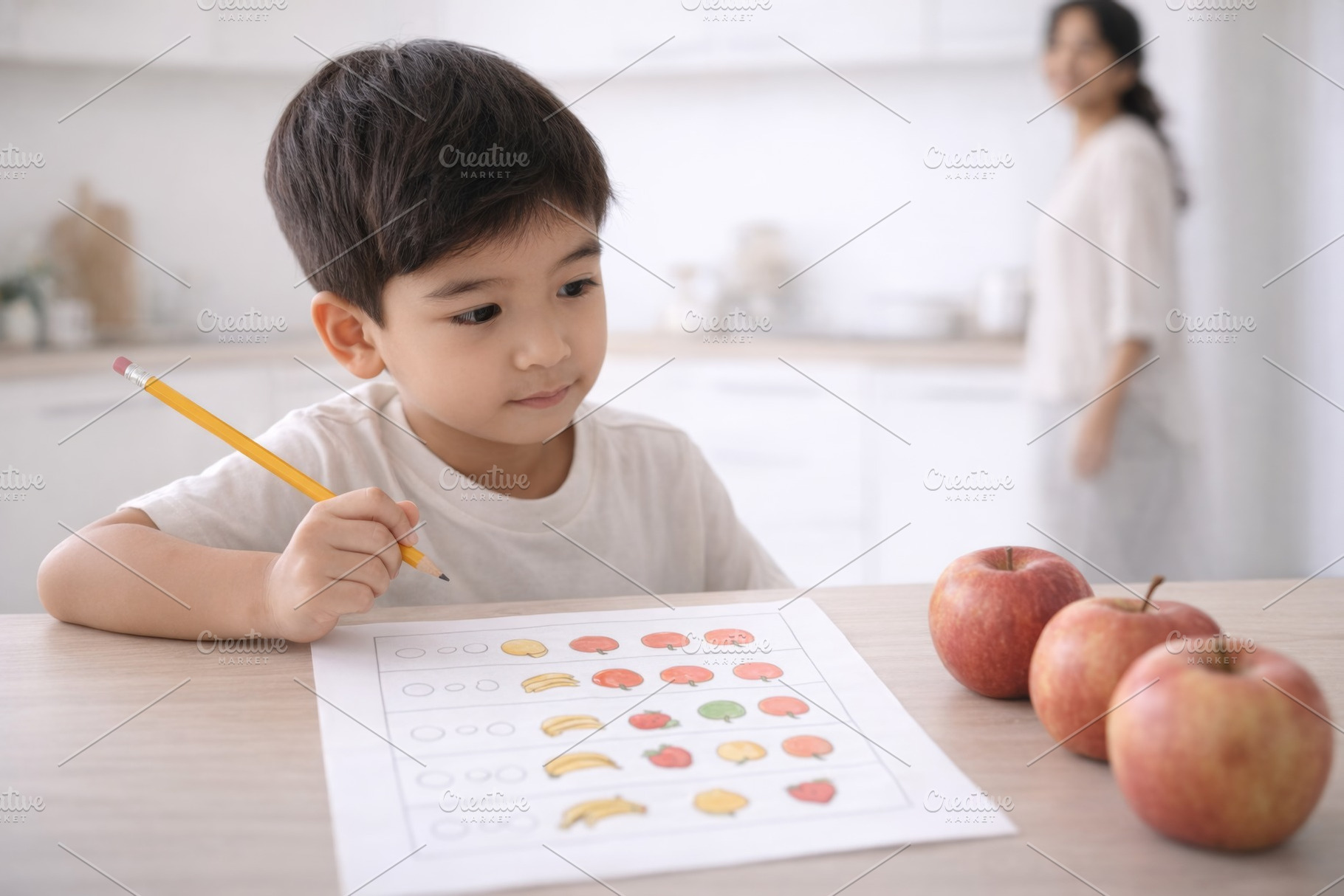 Child engaging with educational work, a Photo by Dvoevnore photos