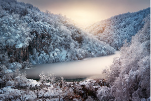 Scenic view of frozen ice lake and, a Nature Photo by den-belitsky