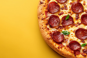 Close up of a hot pepperoni pizza, a Food & Drink Photo by MistyDay