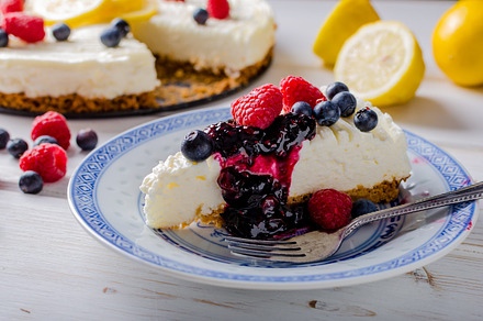 Lemon cheesecake with berries containing lemon, cheesecake, and cake, a Food & Drink Photo by Stepanek Photography