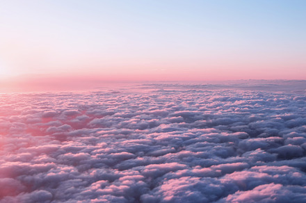 Pink sunset sky with clouds