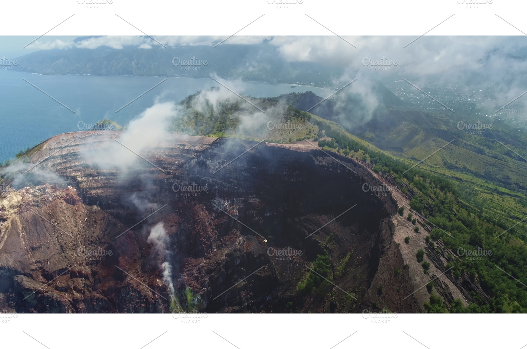 Volcano crater emitting smoke and, a Nature Photo by Goinyk