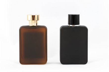 Two Matte Bottles of Perfume for Men, a Background Photo by InfinitumProdux