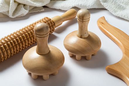 Anti-Cellulite Maderotherapy Instruments on White Table