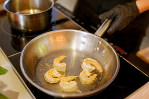 Cooking shrimp frying meal chef pan hand kitchen, a Food & Drink Photo by Photo Drive Studio