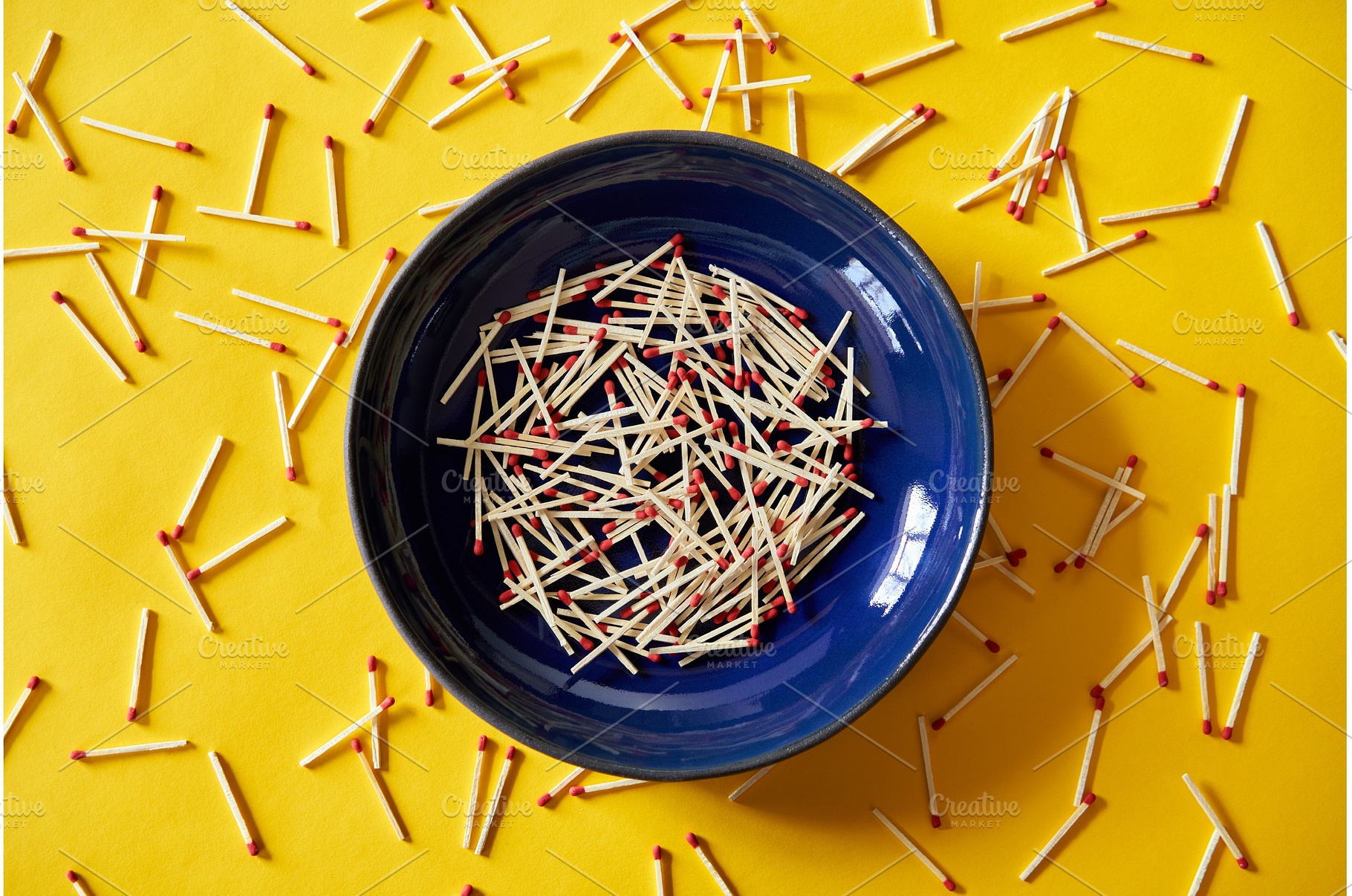 Matches in dark blue bowl over, an Abstract Photo by Gladkov photography