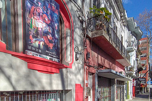 Colorful city street with vivid murals and graffiti on building, an Architecture Photo by DanFLCreativo