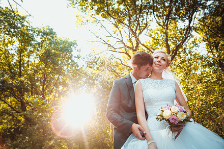 Bride and groom on the forest background stock photo containing adult and, a Person Photo by ruslan117
