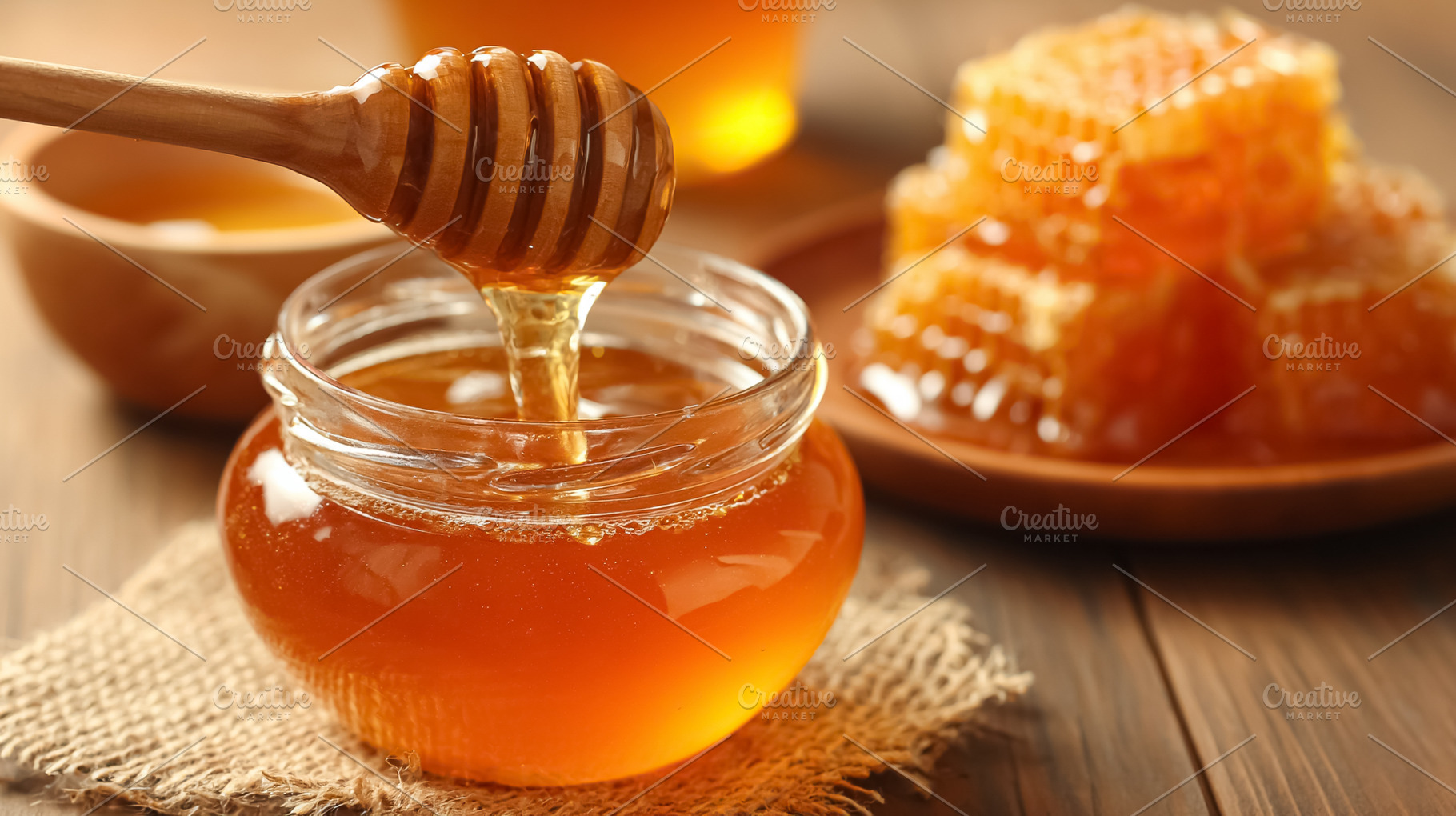 Honey dipper pouring golden natural and organic honey into a gla, a Photo by Studio ANNA