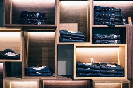 Jeans in shelves containing jeans, denim, and stack, a Beauty & Fashion Photo by HipFonts