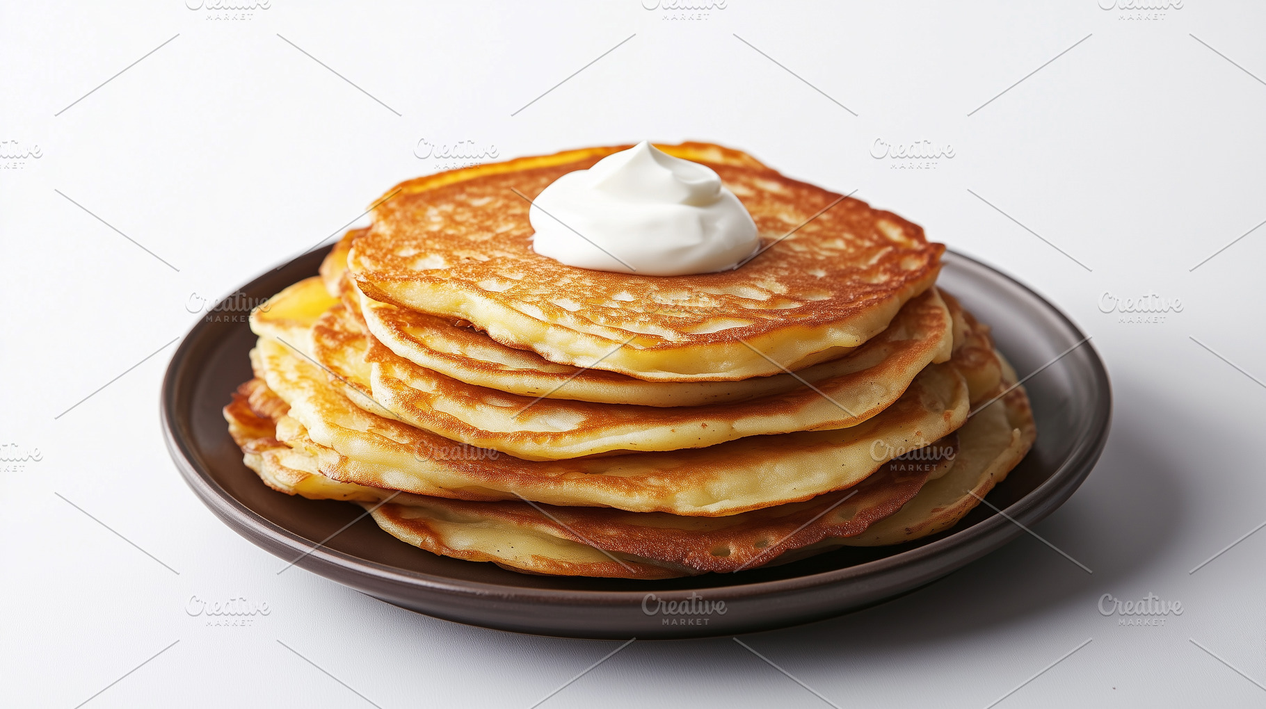 Potato pancakes with sour cream, a Food & Drink Photo by MistyDay