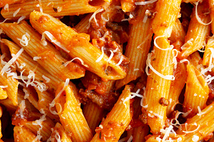 Homemade Pasta Bolognese with Cheese on a Plate, top view., a Food & Drink Photo by LiudmylaChuhunova