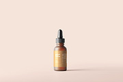 Frosted Glass Dropper Bottle Mockups, a Packaging Mockup by MockupFree.Net (Thumbnail 5 of 6)