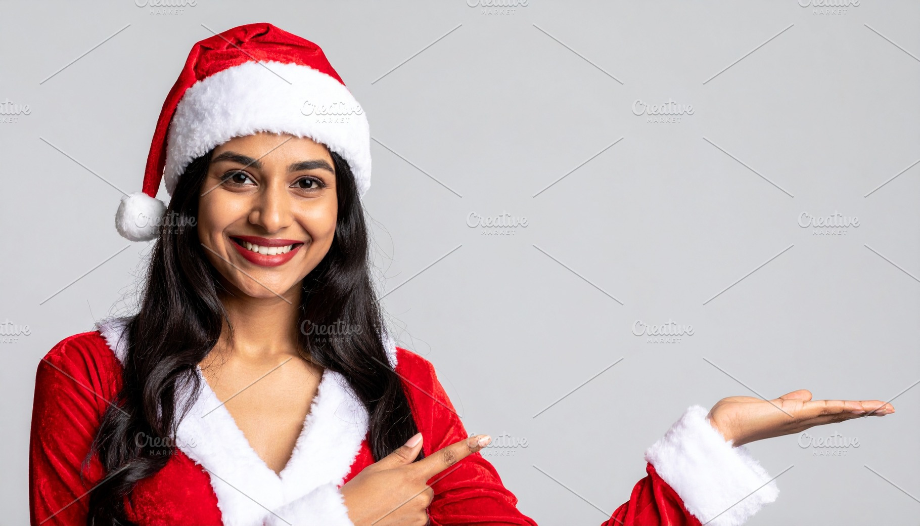 merry christmas card with female santa, a Photo by WorldOfPhotos