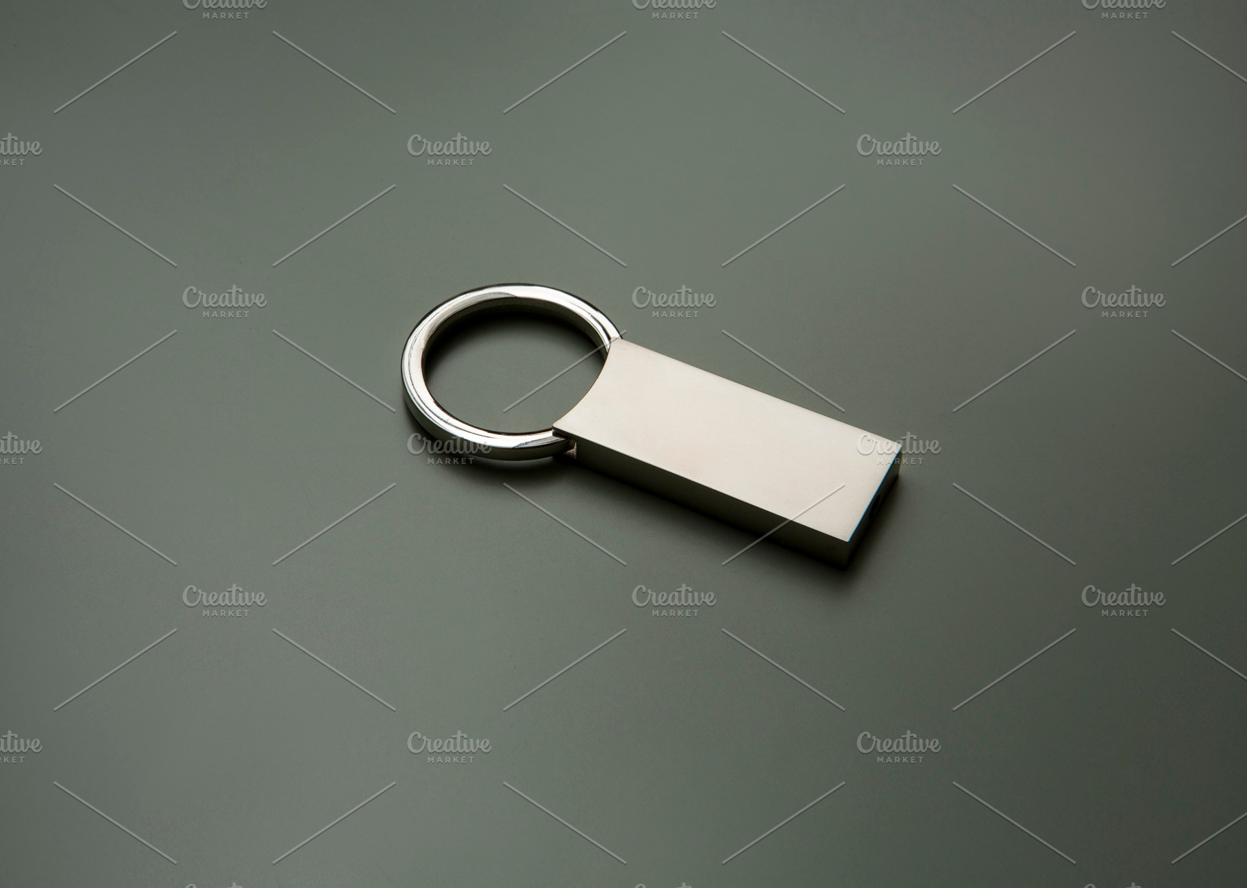 polished silver keychain ring, a Photo by UN-BRANDED