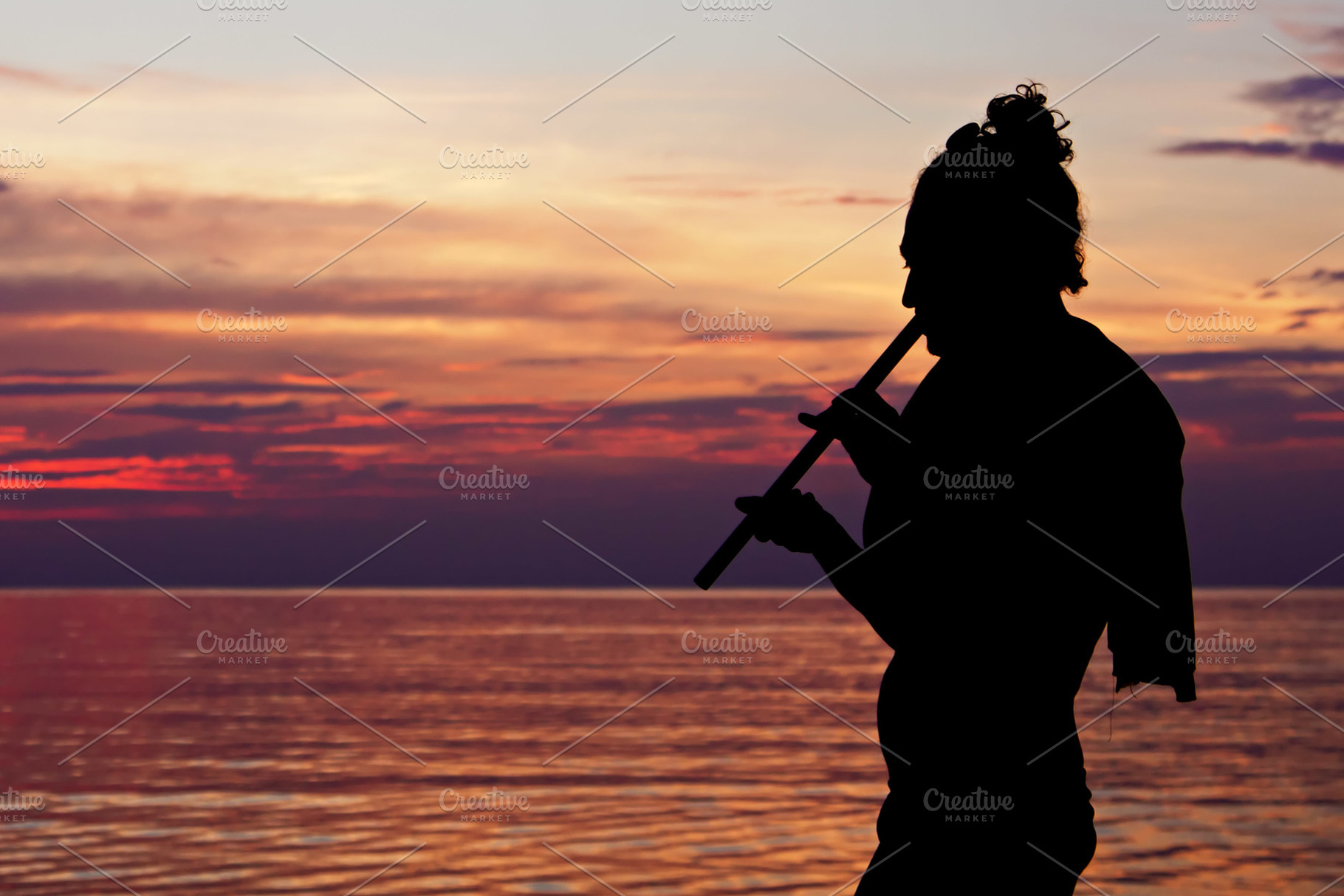 Yoga playing fluite, a Photo by saiko3p