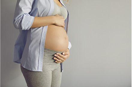 Close up of beautiful belly of, a Person Photo by StudioRomantic