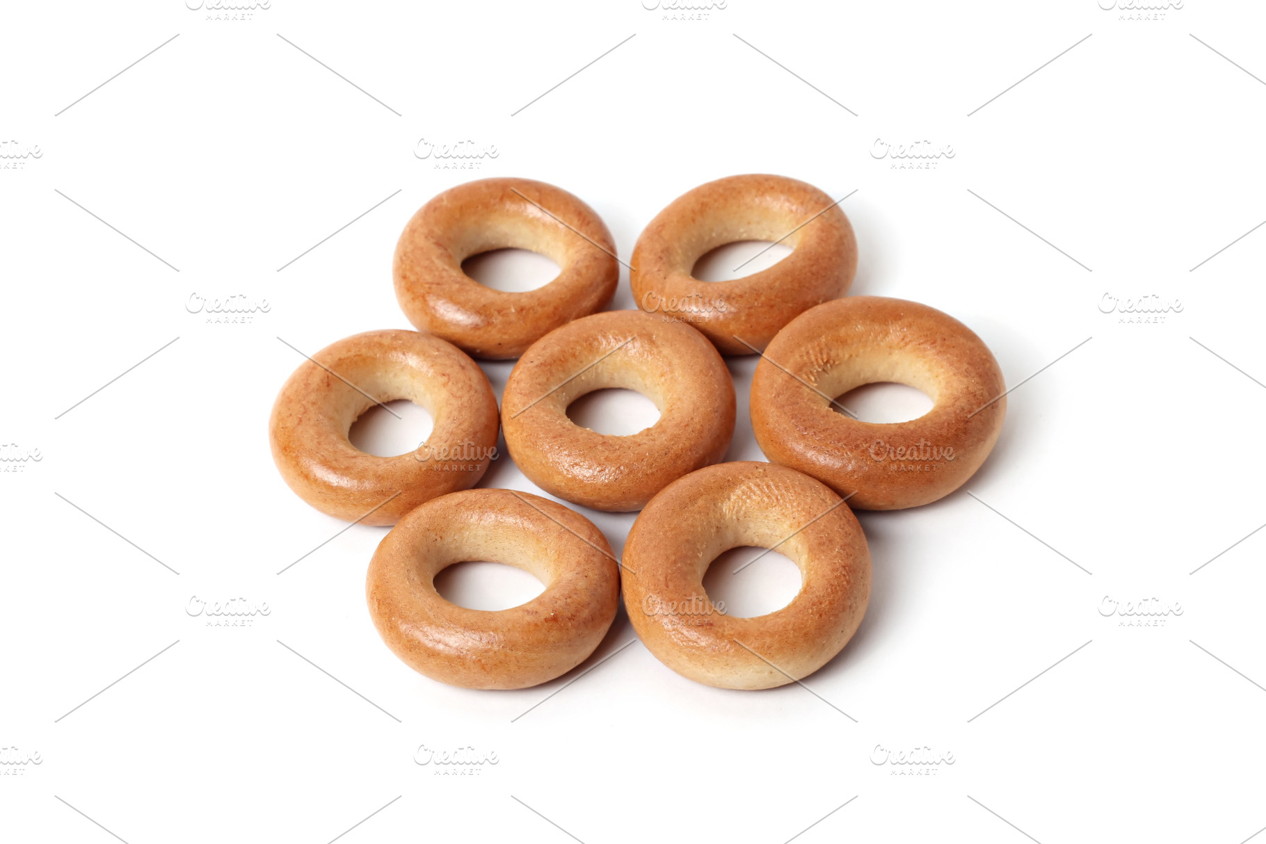 Bread rings isolated, a Photo by saiko3p