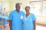 Healthcare professionals smiling in hospital setting, African Am, a Photo by Dvoevnore photos (Thumbnail 2 of 2)