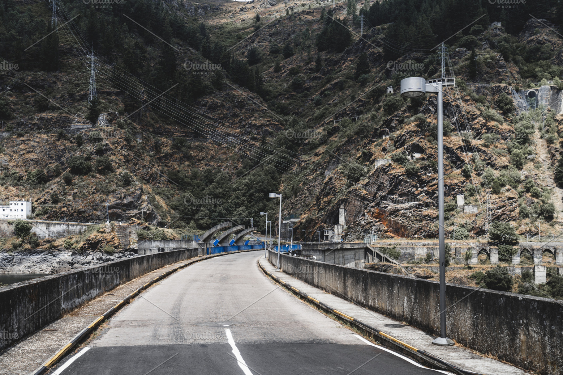 Road on concrete dam, a Transportation Photo by SkyNext