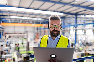 Quality manager with headset and, a Person Photo by HalfPoint