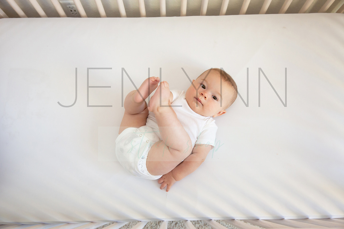 Crib Sheet with Baby Mockup #17, a Product Mockup by JENLYNN Stock Shop (Photo 4 of 5)
