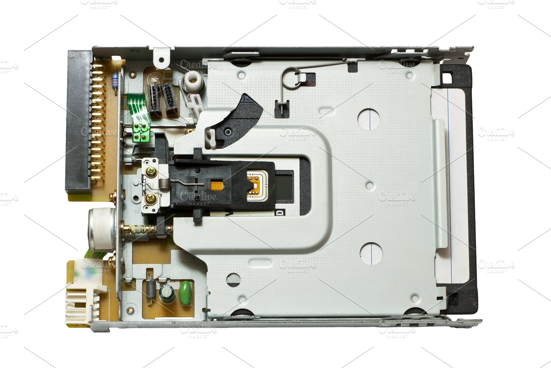 Floppy drive with disk inside, a Technology Photo by Leonid Andronov