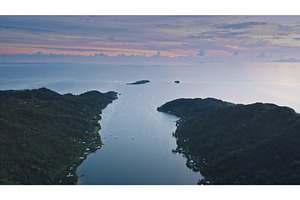 Serene aerial view of coastal, a Nature Photo by Goinyk