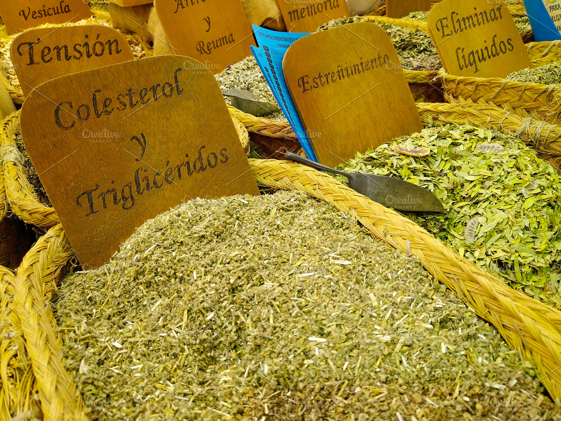 Medicinal herbs on display at health product stand, a Food & Drink Photo by DanFLCreativo