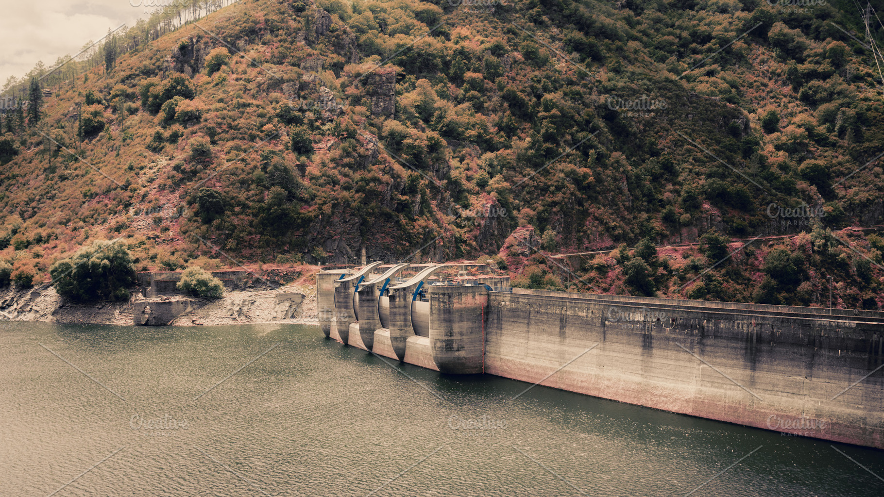 Hydroelectric dam in mountains, an Industrial Photo by SkyNext