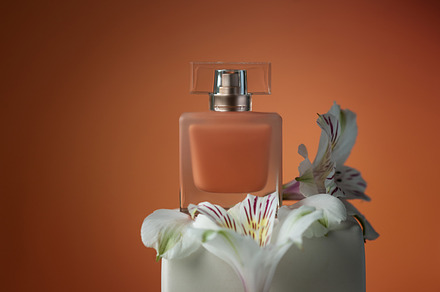 Orange bottle of perfume