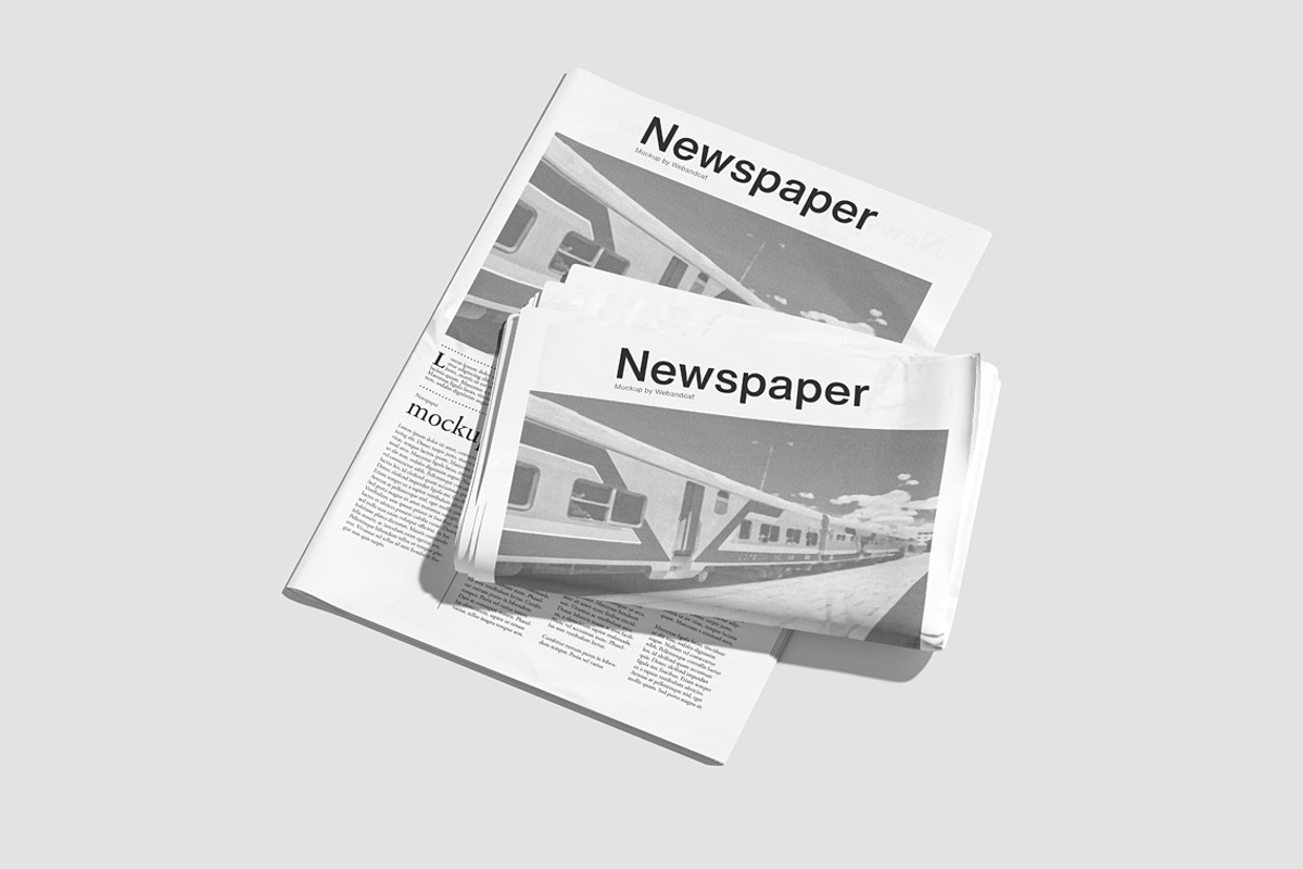 Newspaper Mockup, a Books & Magazine Mockup by WebAndCat (Photo 12 of 13)