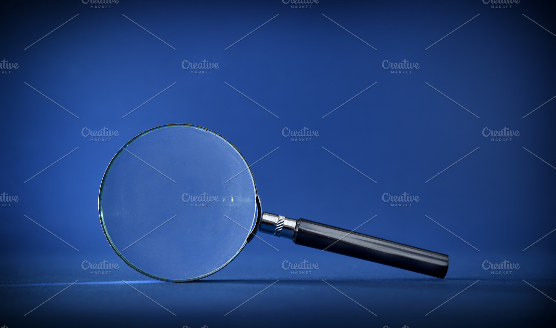Magnifying Glass on Blue Background, a Business Photo by Davizro's Market