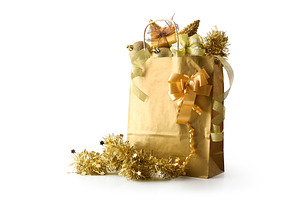 Golden paper gift bag full of Christmas decorations cut-ou, a Holiday Photo by Davizro's Market