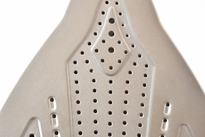 Detail of tip of metal soleplate of a steam iron, a Technology Photo by Davizro's Market