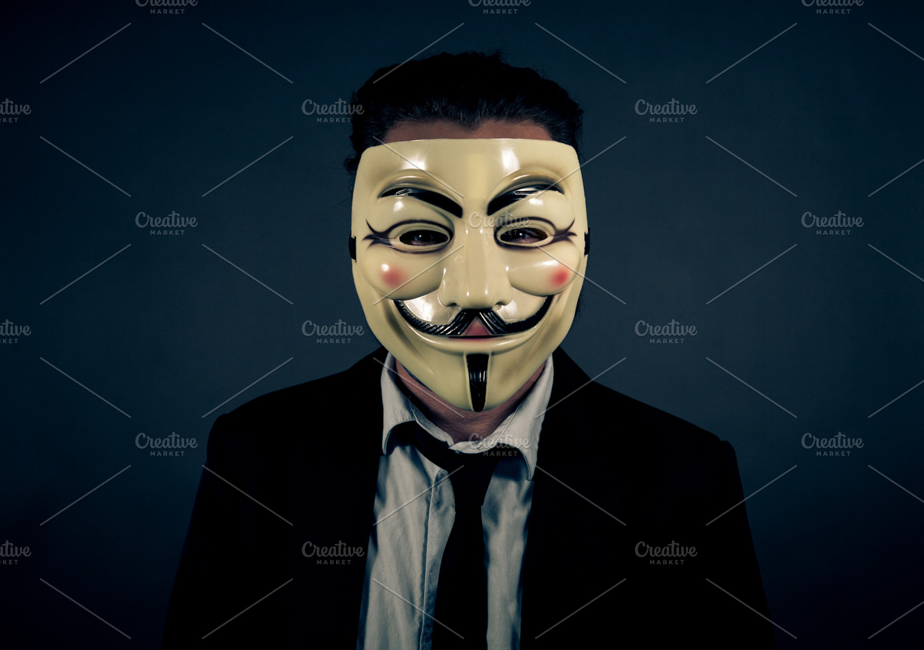 Man in Suit Wearing Anonymous Mask, a Person Photo by Gradivis