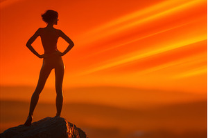 A lone female hiker stands on a, a Sports & Recreation Photo by ZinetroN