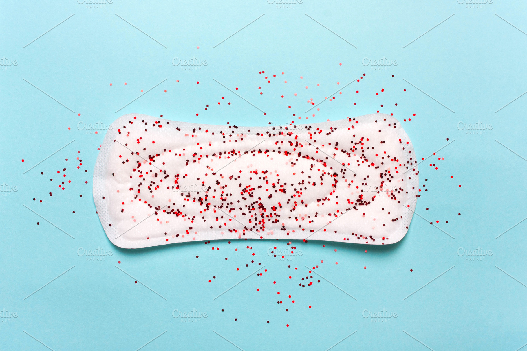 Women's hygiene products on a blue b stock photo containing menstrual and, an Abstract Photo by KulT design
