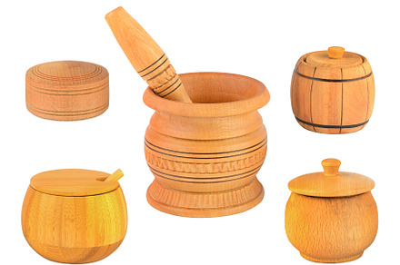 Wooden pestle, mortar and spice boxes isolated on white