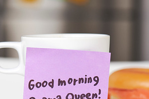 a coffee mug with a handwritten morning note, a Photo by Nito