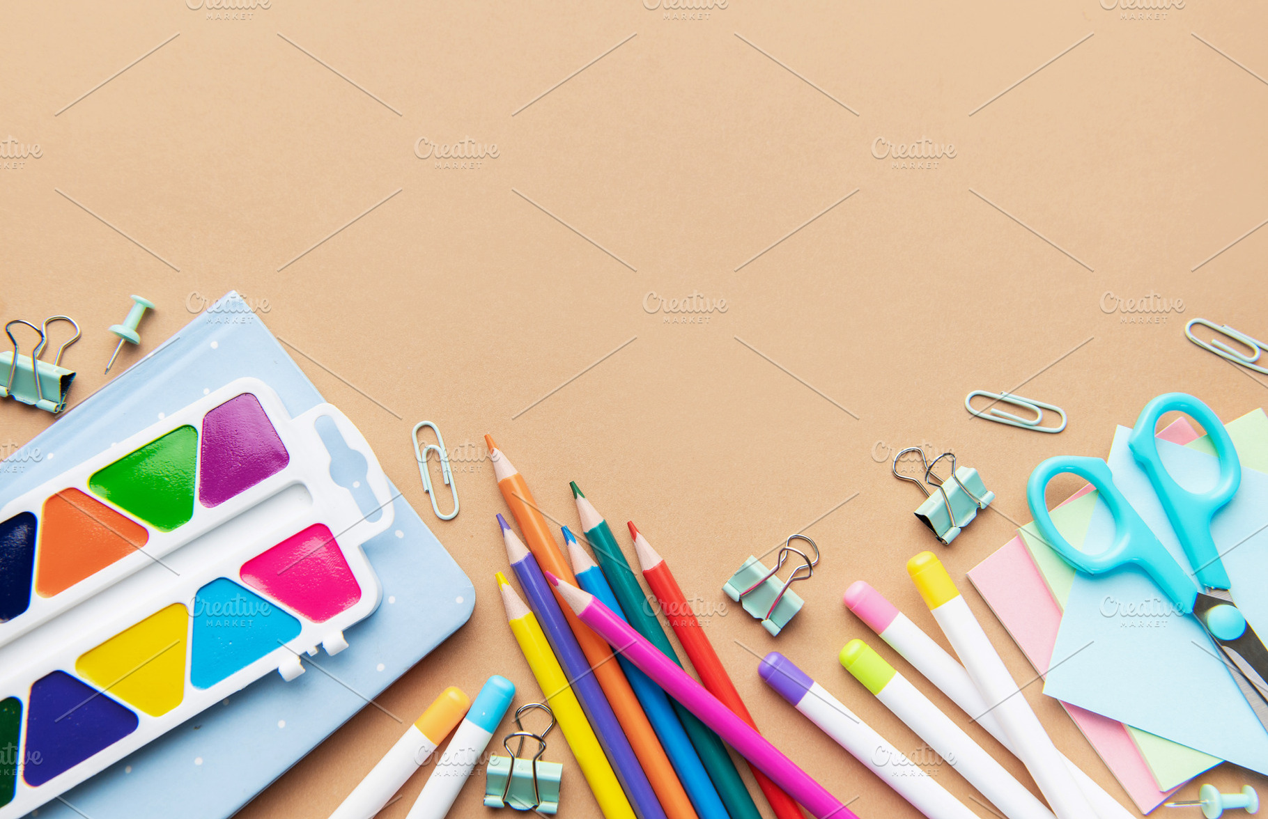 School supplies and art tools creating colorful education concep, a School & Education Photo by Olena Rudo
