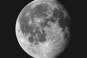 Gibbous moon seen with a telescope, a Photo by WorldOfPhotos