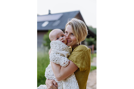 Portrait of happy mother with her, a Person Photo by HalfPoint
