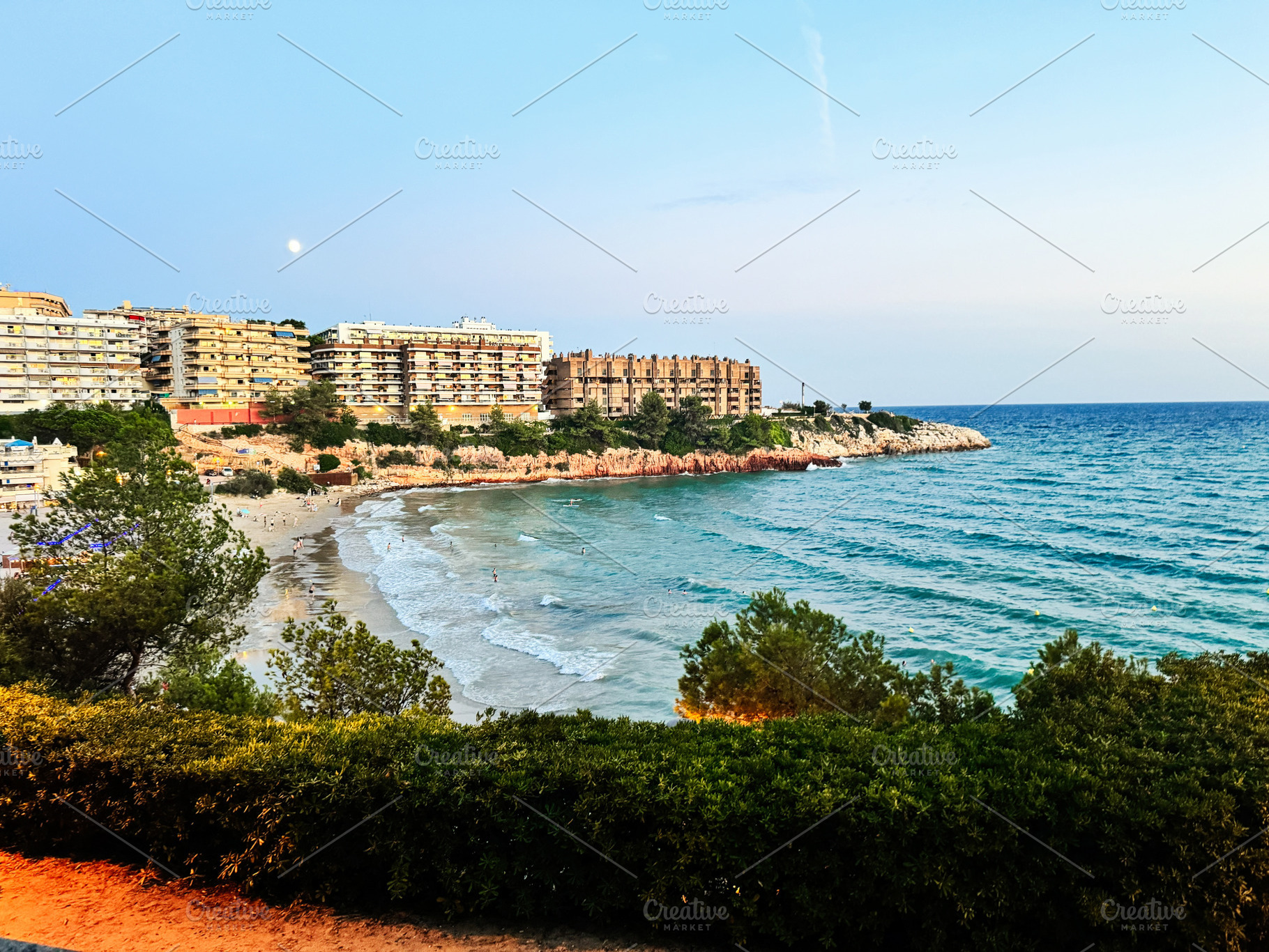 Coastal skyline and beach view in Tarragona, Catalunya, Spain under clear sky, a Photo by AS photostudio