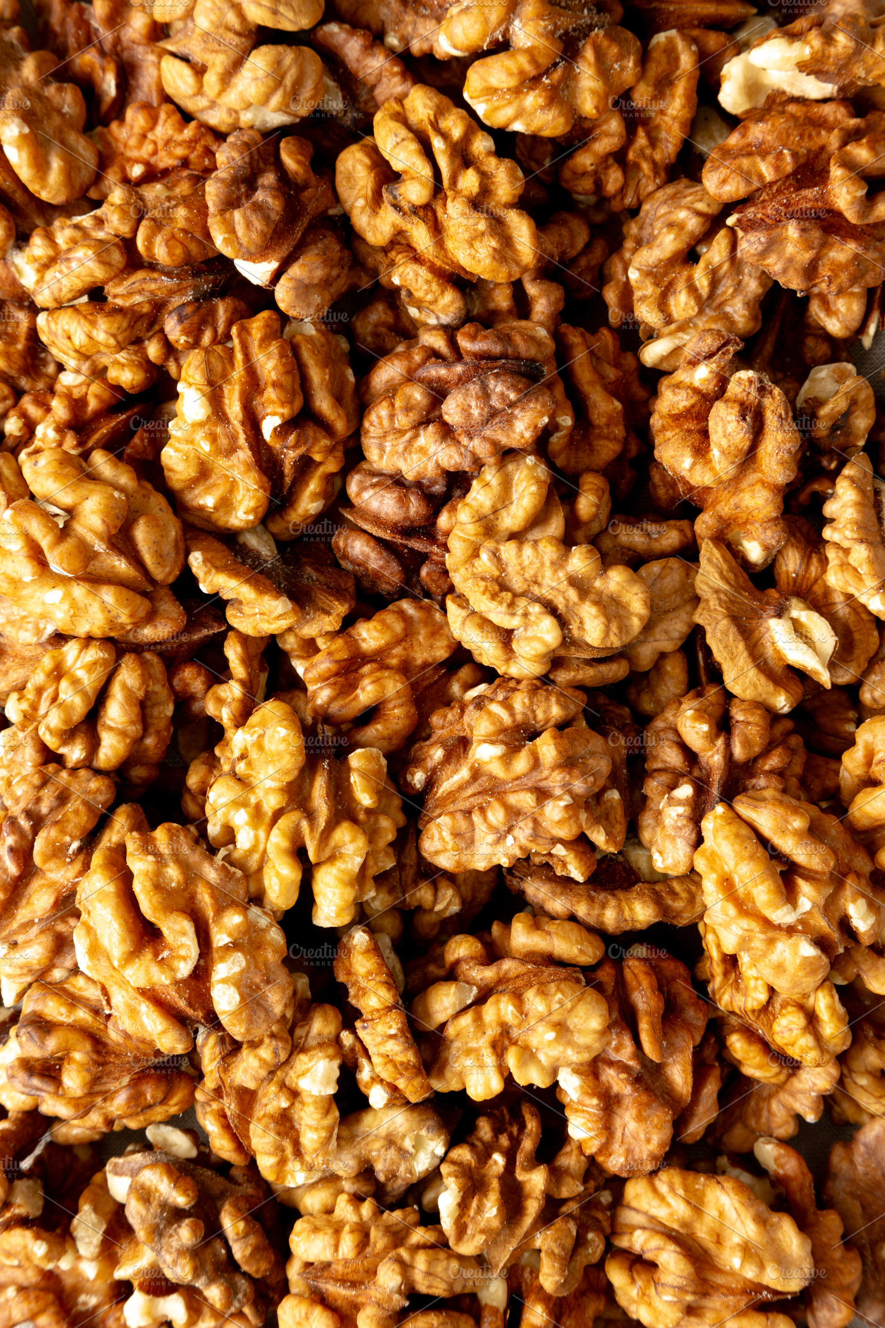 Raw Walnut Halfs, top view. Flat lay, overhead., a Food & Drink Photo by LiudmylaChuhunova